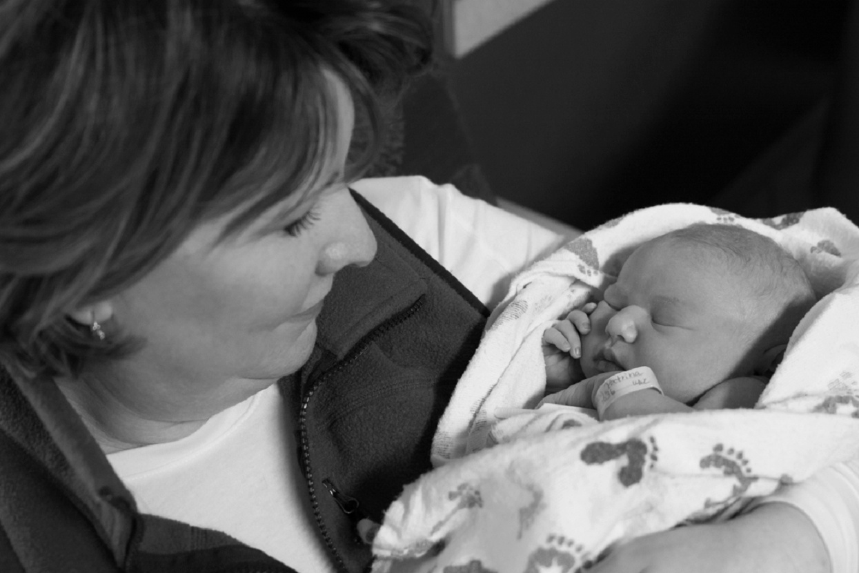 Family holding the baby for the first time