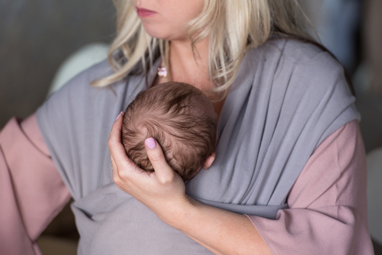 Baby in a purple Moby wrap